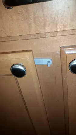 Dog proof pull out trash lock
