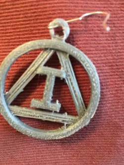 Earring with an I