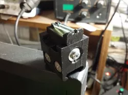Picattiny rail mounted sport style AR15 rear sight with fiber optic and windage adjust