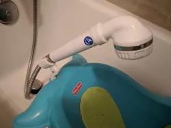 Shower head holder for Fisher Price Whale Bath