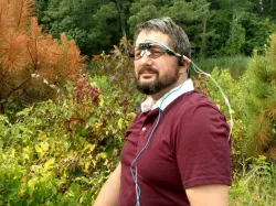 Head-mounted LiDAR array that communicates through bone conduction