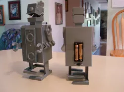 Mr. Mech 3d printed robot. walking with moving arms and mouth.