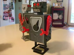 RoBox , 3d printed walking robot, moving Arms, Head and meter.