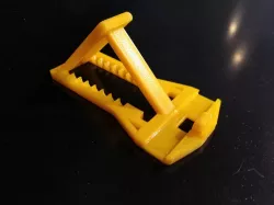 Foldable phone stand with front grip