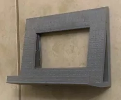 Wall phone holder