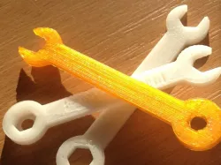 Customizable Wrench with Nut holding Cap