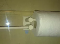 Toilet paper holder which can stick on the wall by 3M wall sticker.