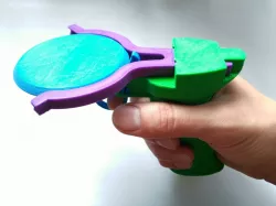 Mini disc catapult