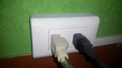 Caja toma-corriente