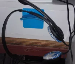 Headphone holder suitable for adhesive tape fixture