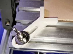 CNC corner hold-downs