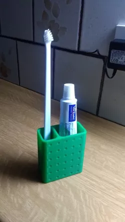 Tooth brush and paste holder