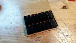 Retro LED-lit pushbutton for tactile switch