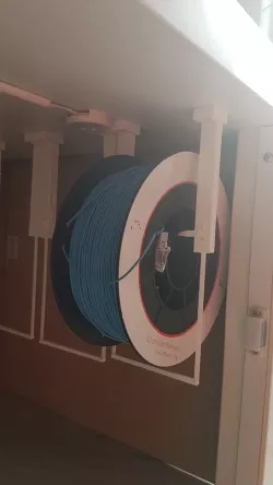 spool holder for in enclosure