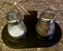 Stand for salt, pepper and toothpicks.