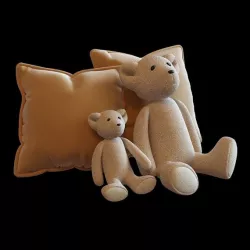 Toy bear figure with pillows