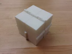 Magic Folding Cube or Eight Hinged Boxes