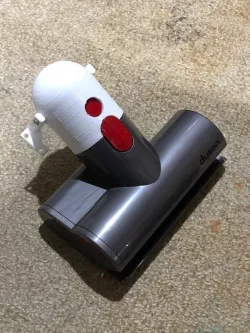 Dyson hinged accessory holder for V8