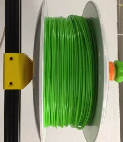 Holding block for filament spool axis