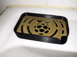 Soap holder plate in Raspberry Pi logo design