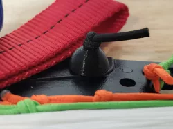 Kite line winder bungee ball and washer