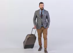 Jacob 0432 Man in a Suit carrying a Bag on Wheels 3D model