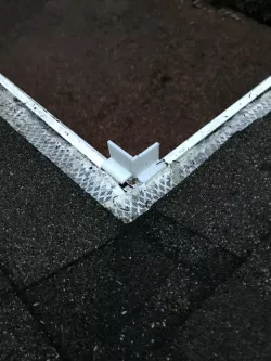 Gutter guard valley shield