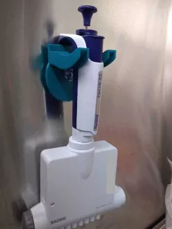 Suction cup attachable pipette holder