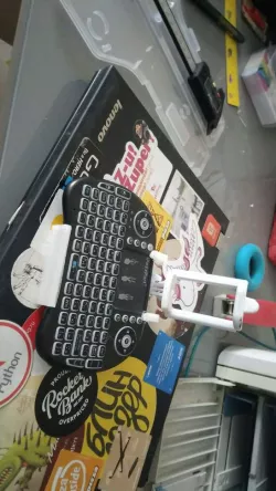 Holder for phone keyboard