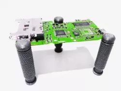 Magnetic spring loaded PCB holder