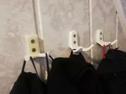 Wall mounted coat hanger