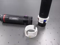 Coast flashlight button guard