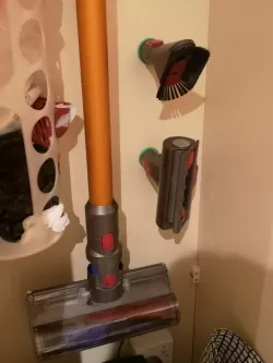 Dyson attachment holder