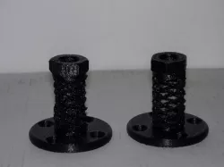 Double spring vibration dampening threaded mounting flange for flexible filament.