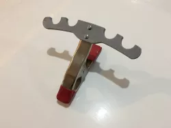 Pool cue spring clamp