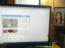 A cellphone mount on monitor 