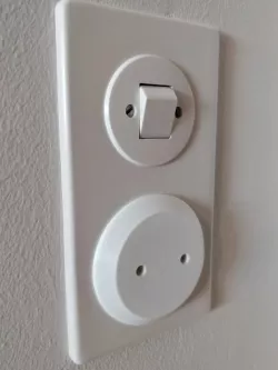 Covers for light switches from 1960s