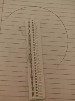 Ruler with compass holes