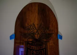 Snowboard vertical wall mount