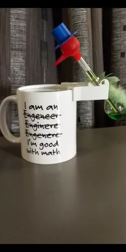 Drinking bird mug holder