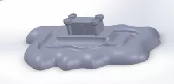 A mold of a Castle with a surrounding Moat