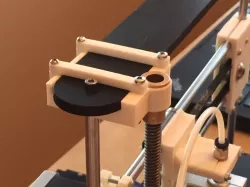 QUBD : Bearing holder to prevent z-rod wobbling