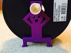 Man Holding Spool
