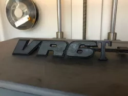 VR6T car grill logo
