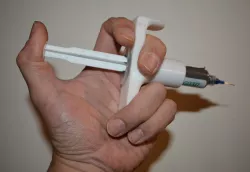Syringe Assist (Holder) for Strain Relief