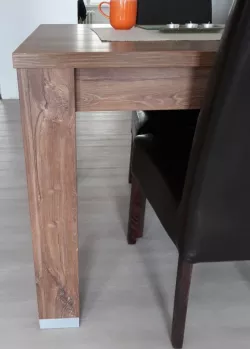 Table leg extension