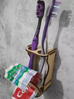 Holder for toothbrushes and toothpaste