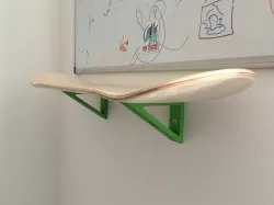 Skateboard deck shelf