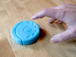 A vRoomba - Pull Back Motor Vacuum Robot