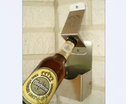 Bottle opener with cap collecting box